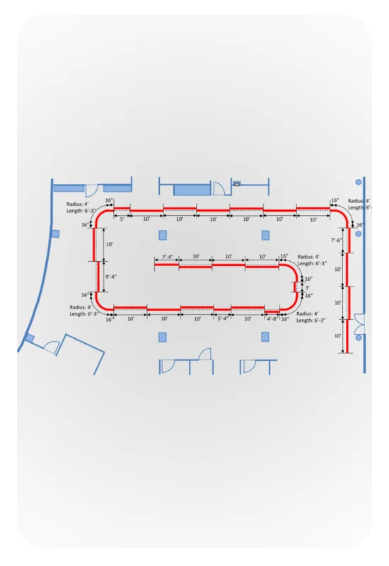 Floor-plan diagram of an extended ZeroG overhead track routed around a therapy gym